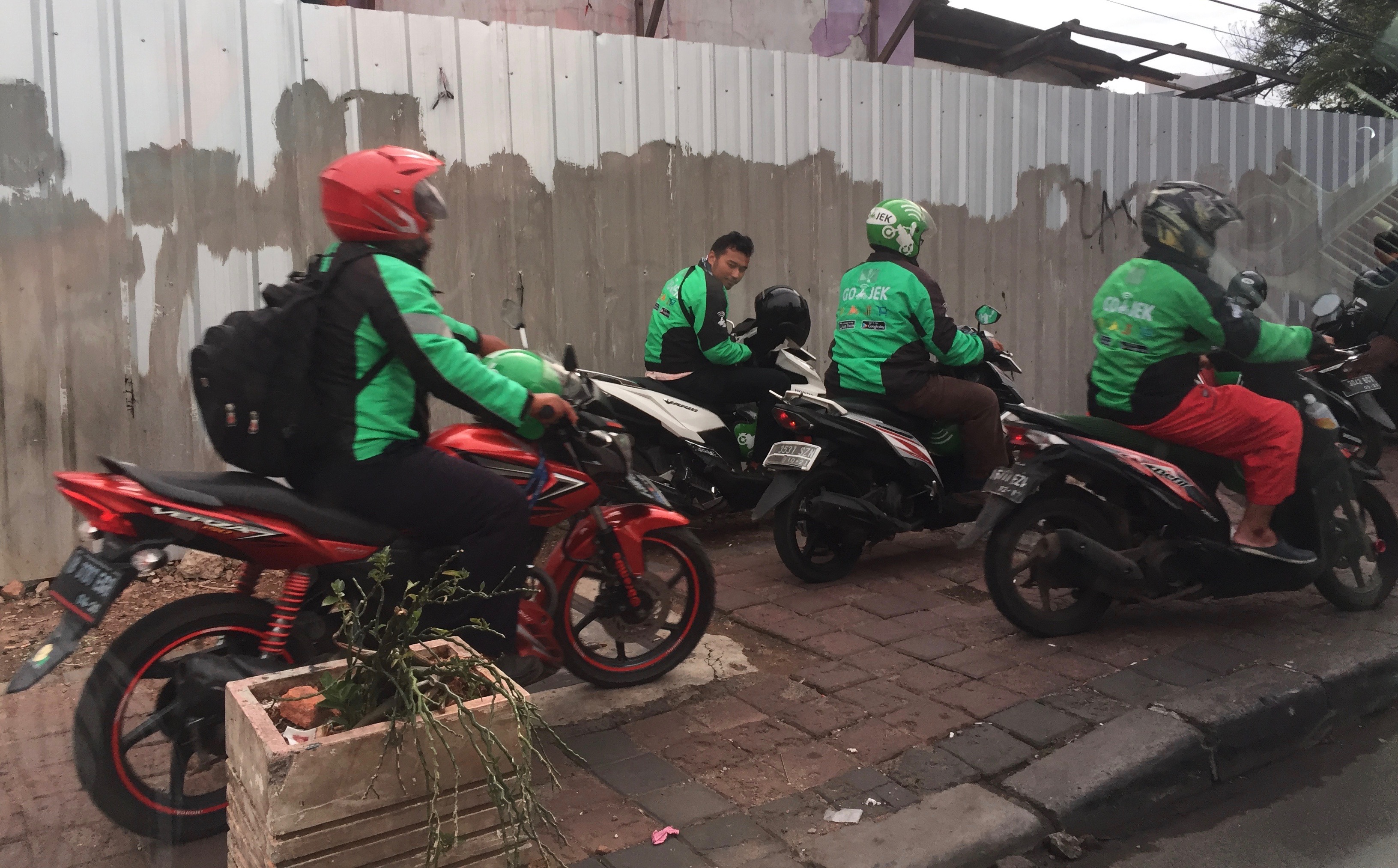 A group of Go-Jek drivers